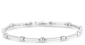 18k white gold tennis bracelet with gold square framed round diamonds and gold rectangle bars