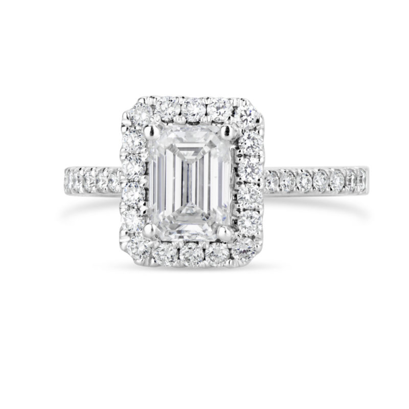 diamond halo emerald cut white gold engagement ring with diamond band
