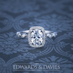white gold oval diamond engagement ring diamond halo engagement ring intricate diamond band detail