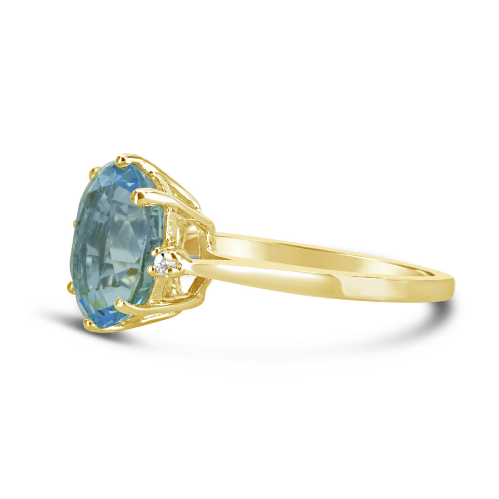 blue topaz and diamond yellow gold ring solitaire coloured stone ring December birthstone ring