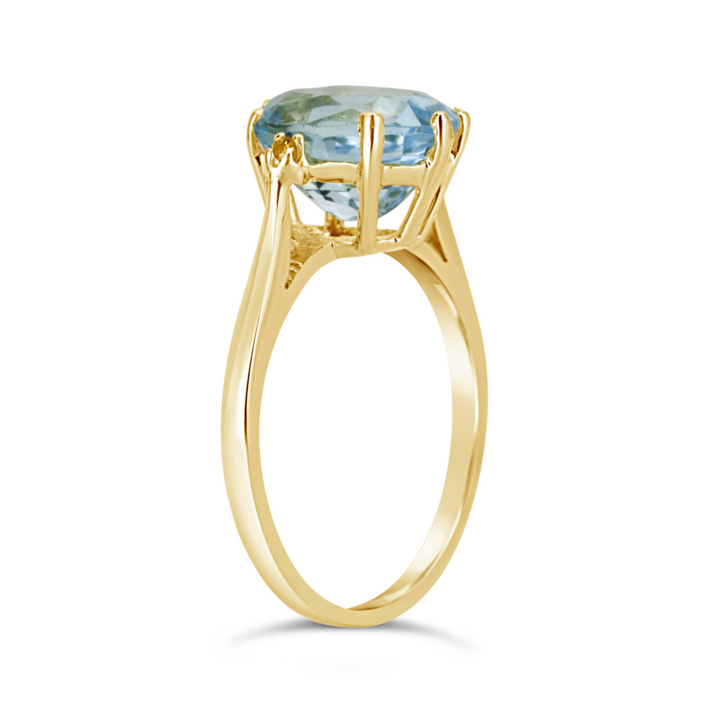 yellow gold blue topaz gem stone coloured stone birthstone solitaire claw ring