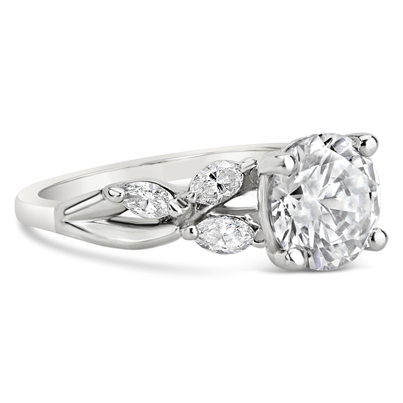 Diamond leaf shapes white gold engagement ring