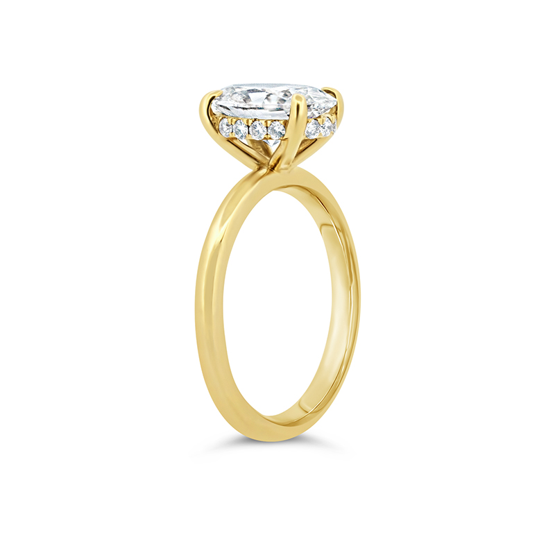 hidden halo oval diamond engagement ring yellow gold