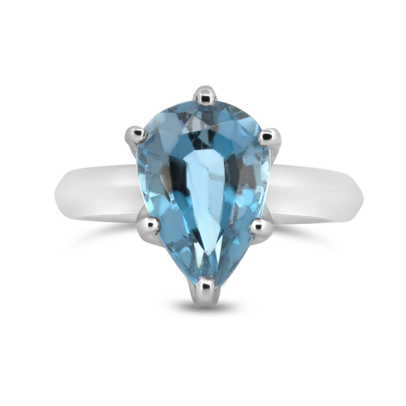 white gold knife edge pear cut blue topaz solitaire cocktail ring
