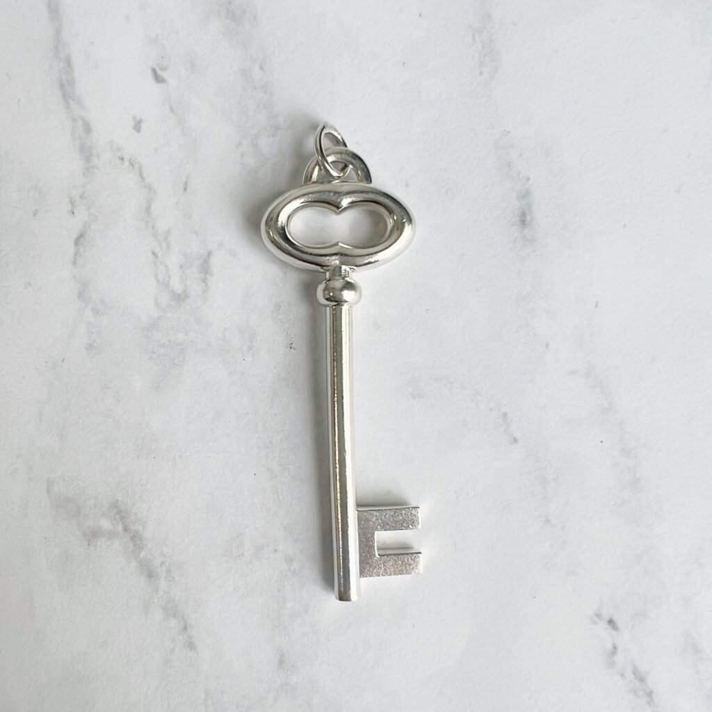 PD00662 Tiffany & co sterling silver key charm pendant