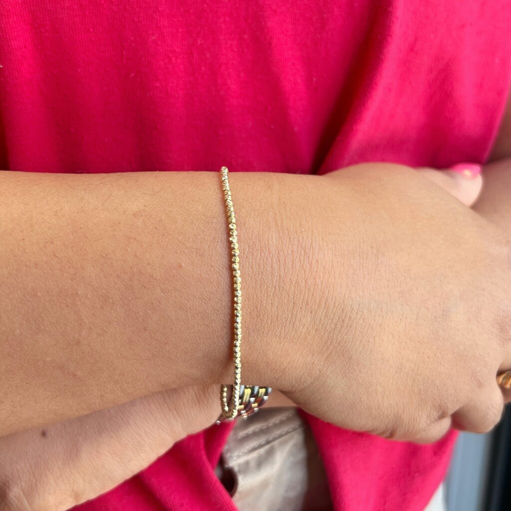 model yellow gold diamond cut ball bracelet