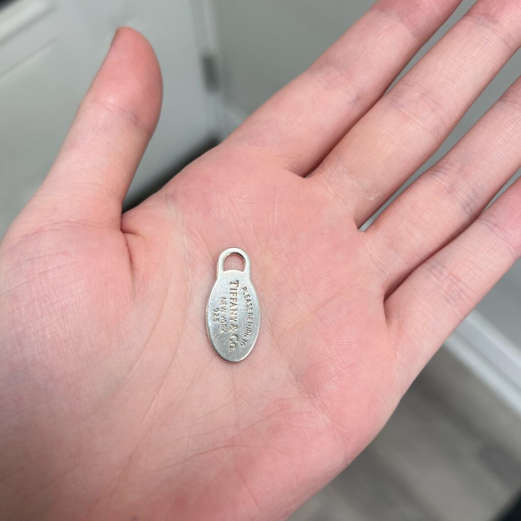 Tiffany and co oval charm sterling silver hand