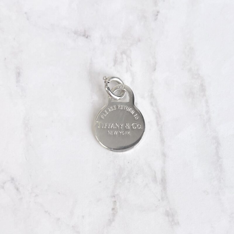 Tiffany and co round charm sterling silver