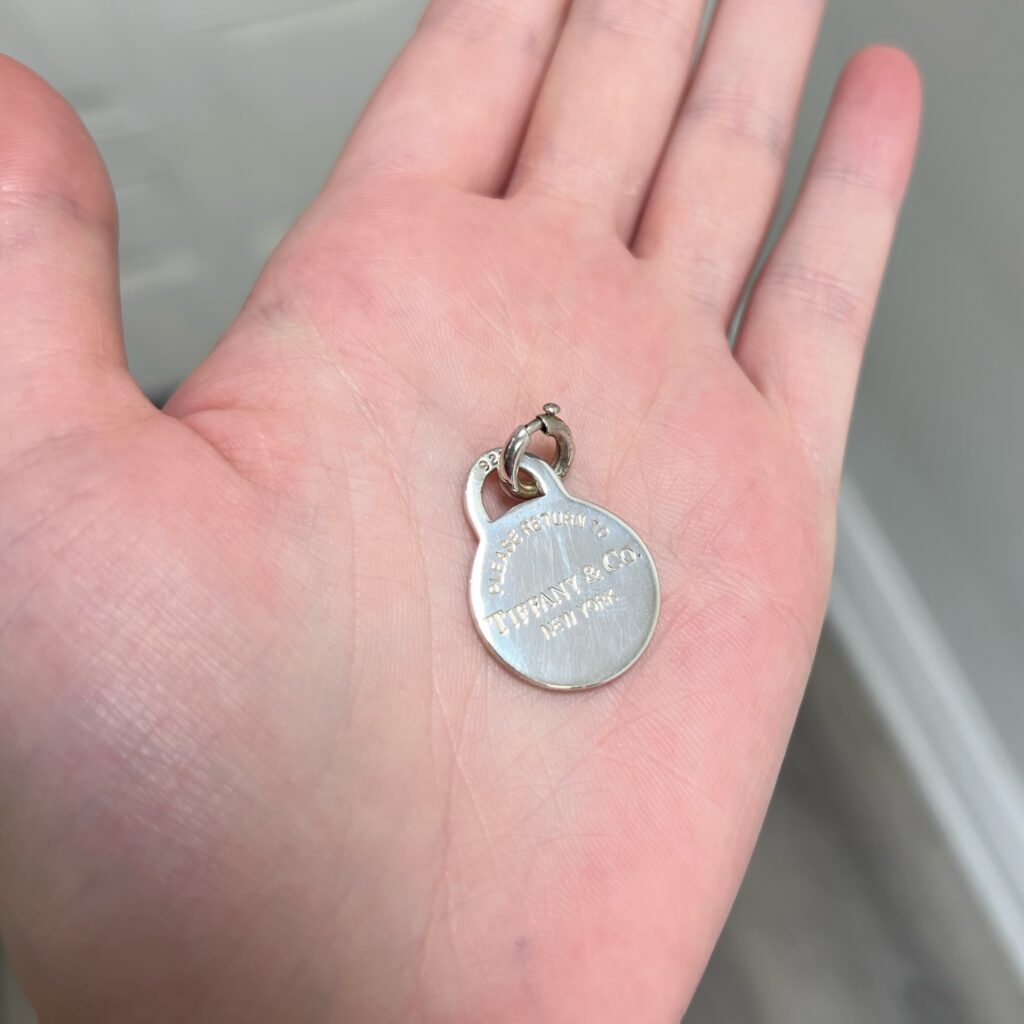 Tiffany and co round charm sterling silver hand